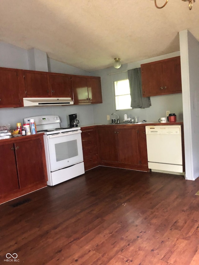 kitchen featuring dark wood-style flooring, lofted ceiling, a sink, white appliances, and extractor fan