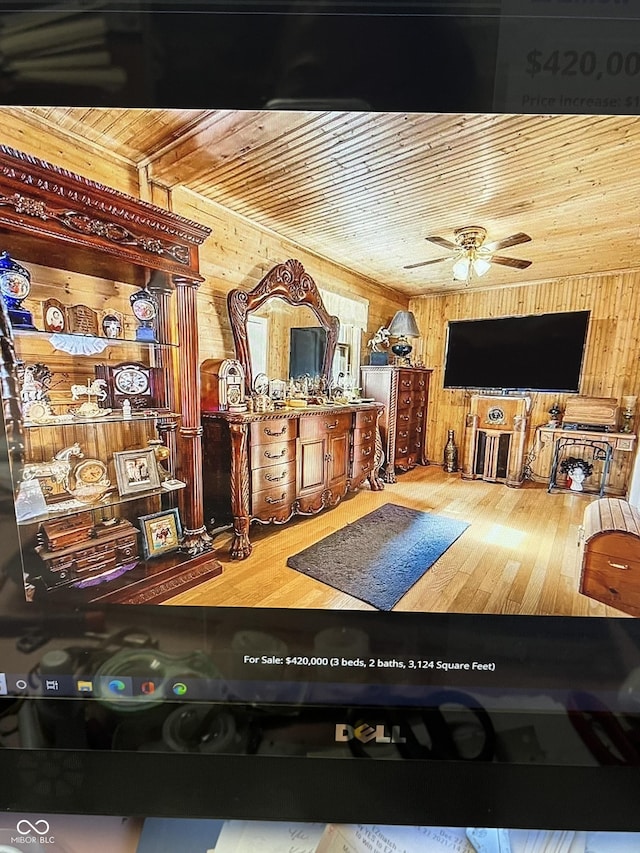 4005 Texas Pike, Spencer, IN 47460 - living area featuring wooden ceiling, wooden walls, ceiling fan, and hardwood / wood-style flooring