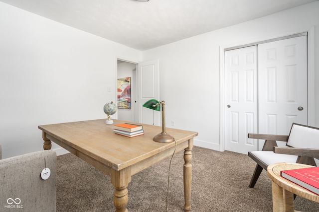 home office with carpet and baseboards