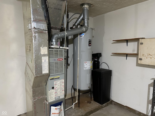 utility room featuring heating unit and water heater