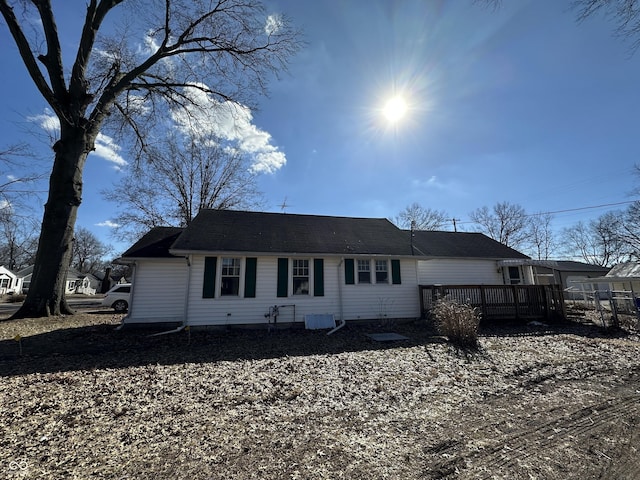 view of front of property featuring a wooden deck