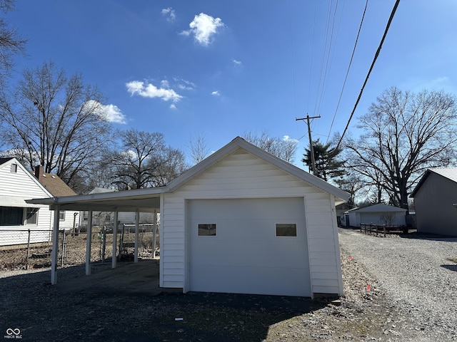 view of outbuilding with an outbuilding and driveway