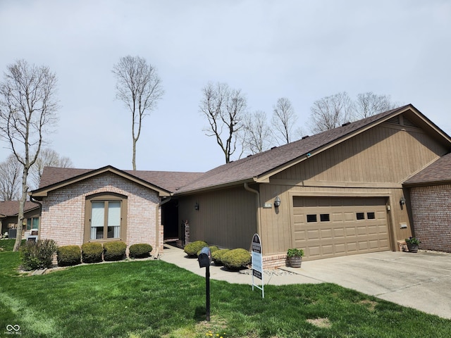 3636 Woodglen Way, Anderson, IN 46011 - ranch-style house featuring a garage, concrete driveway, a front yard, a shingled roof, and brick siding
