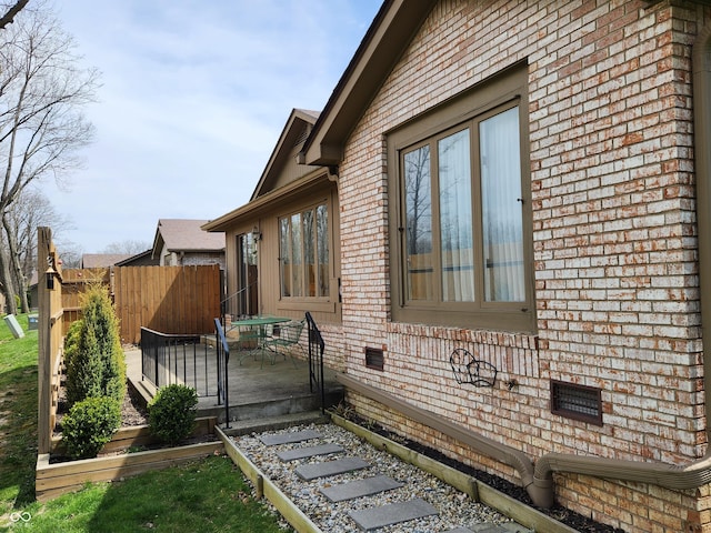 3636 Woodglen Way, Anderson, IN 46011 - view of side of home with brick siding and fence