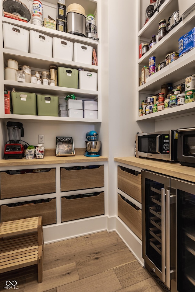 storage area with beverage cooler