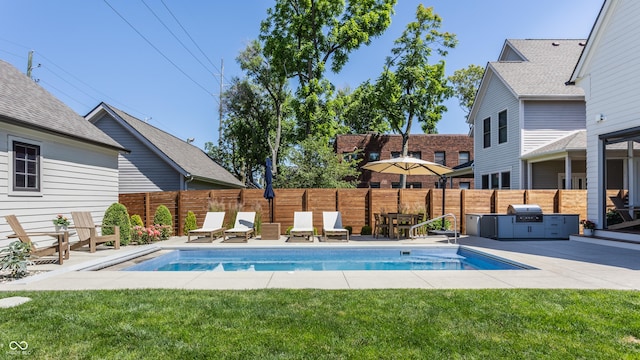 view of pool with a grill, a fenced in pool, a fenced backyard, and a patio