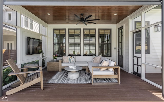 sunroom with wooden ceiling and ceiling fan