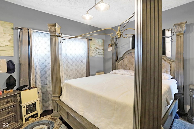 bedroom featuring a textured ceiling