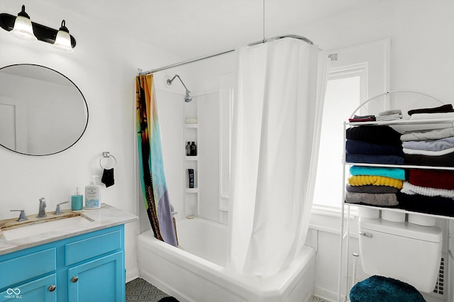 bathroom featuring toilet, shower / bath combo, and vanity