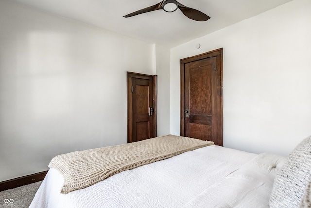 bedroom with baseboards and ceiling fan