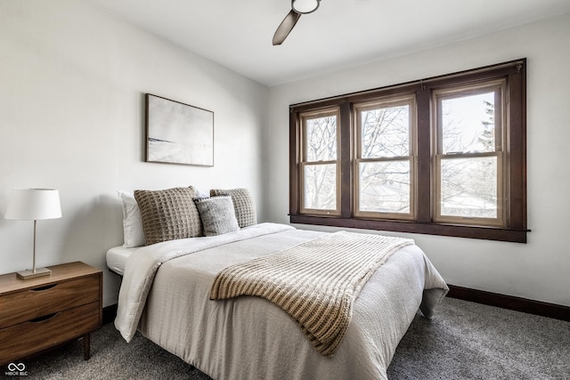 bedroom with carpet flooring, a ceiling fan, and baseboards