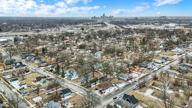 birds eye view of property with a view of city