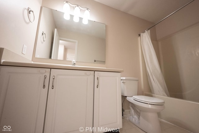 full bath featuring toilet, shower / bath combo, tile patterned flooring, and vanity