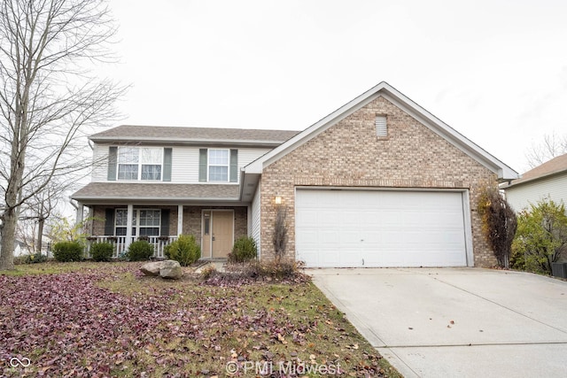 traditional-style house with covered porch, driveway, brick siding, and an attached garage