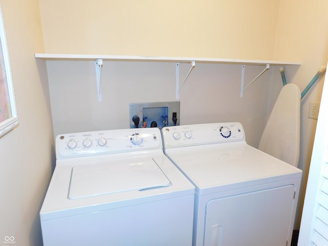 laundry area featuring laundry area and washer and dryer