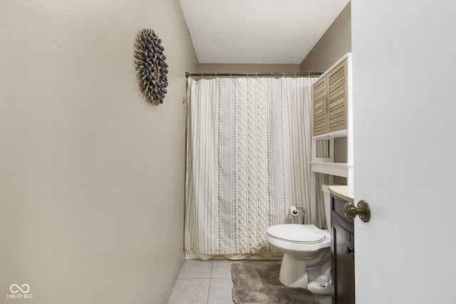 full bathroom featuring a textured ceiling, toilet, tile patterned floors, vanity, and a shower with curtain