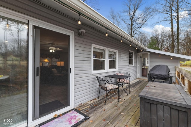 wooden deck featuring grilling area