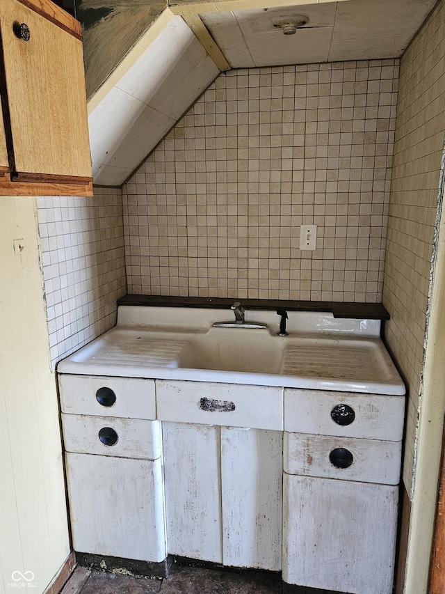 bathroom with vaulted ceiling