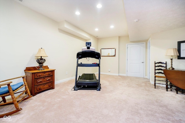 exercise area with carpet, baseboards, and recessed lighting