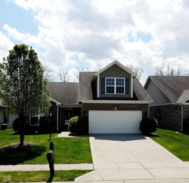 view of front facade featuring a garage, brick siding, a front lawn, and driveway