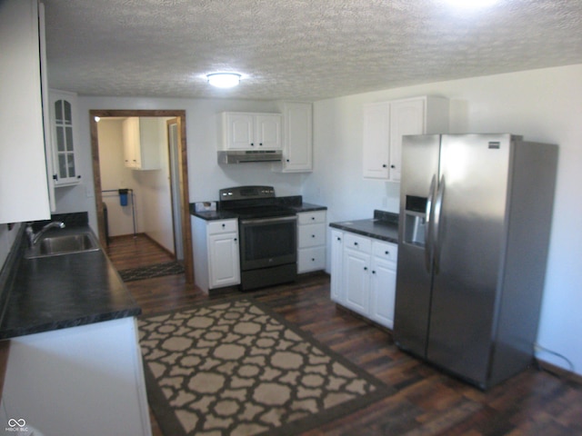 kitchen with white cabinets, dark countertops, black / electric stove, under cabinet range hood, and stainless steel refrigerator with ice dispenser