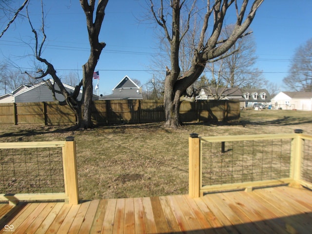 view of yard with a wooden deck and fence