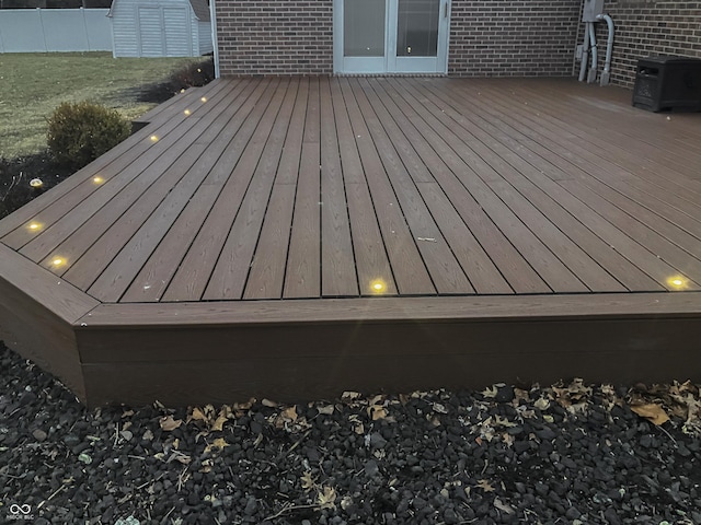 wooden deck featuring fence