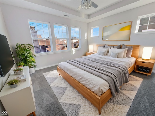 bedroom featuring carpet, visible vents, ceiling fan, and baseboards