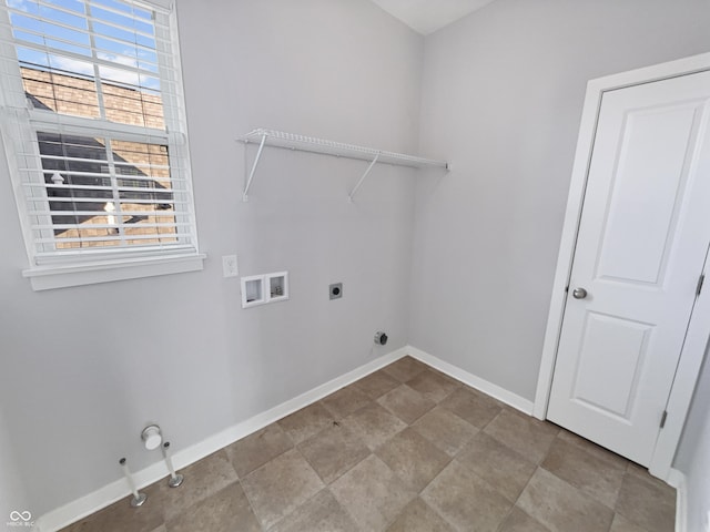 laundry room with laundry area, hookup for a washing machine, baseboards, and hookup for an electric dryer