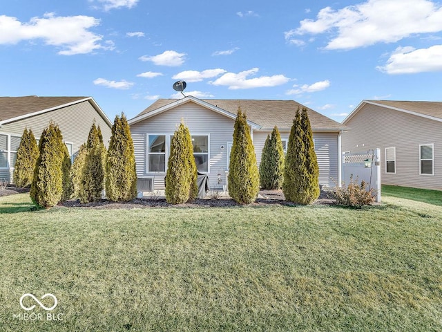 view of front of property with a front lawn