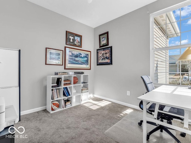 office area with carpet flooring and baseboards