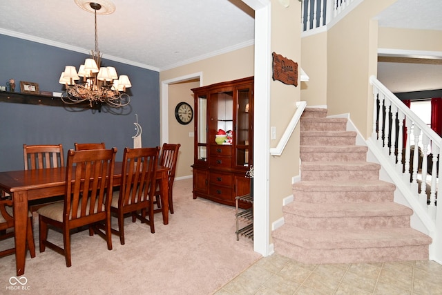 dining area with ornamental molding, a chandelier, baseboards, and stairs