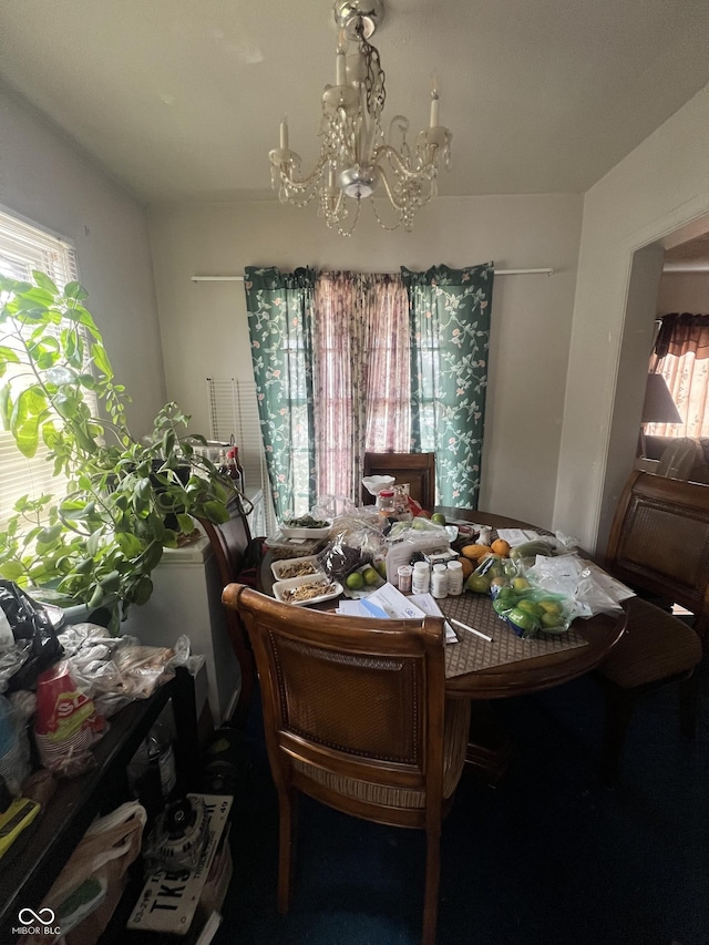 dining room featuring an inviting chandelier