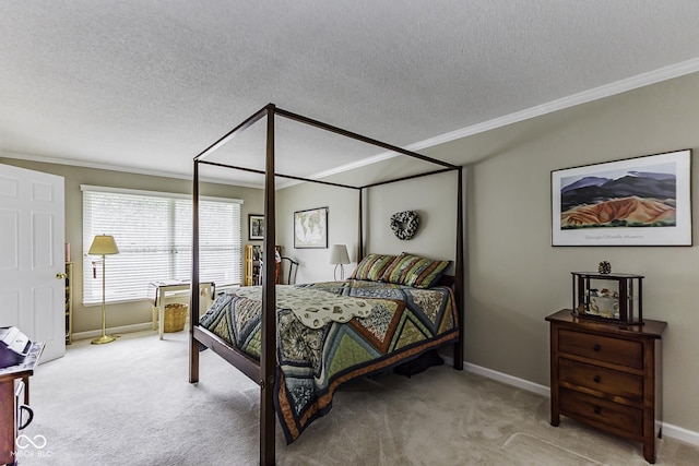 bedroom with light colored carpet, a textured ceiling, and baseboards