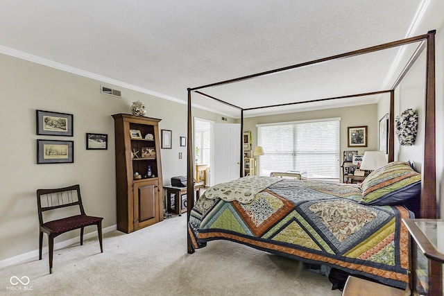 bedroom featuring baseboards, visible vents, light colored carpet, a textured ceiling, and crown molding