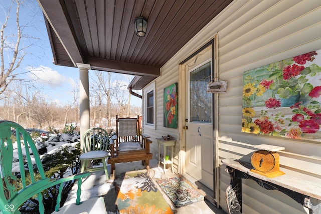 view of snow covered deck