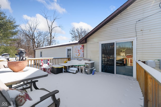 view of snow covered deck