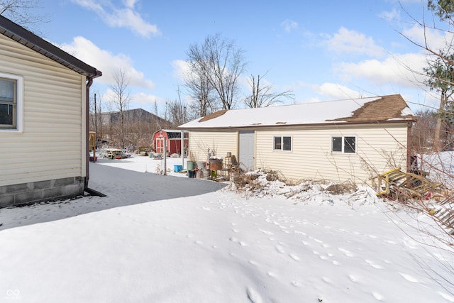 view of snow covered property