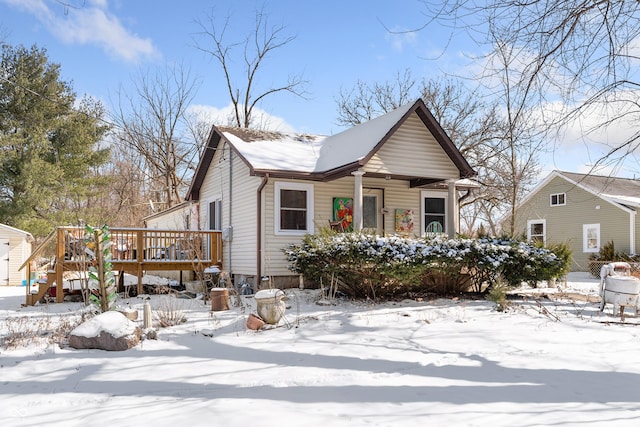 view of front of house featuring a wooden deck