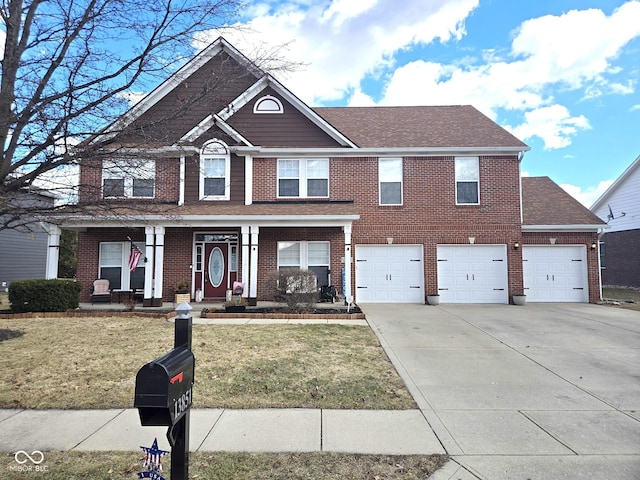 view of front of property featuring concrete driveway, brick siding, a front yard, and a shingled roof