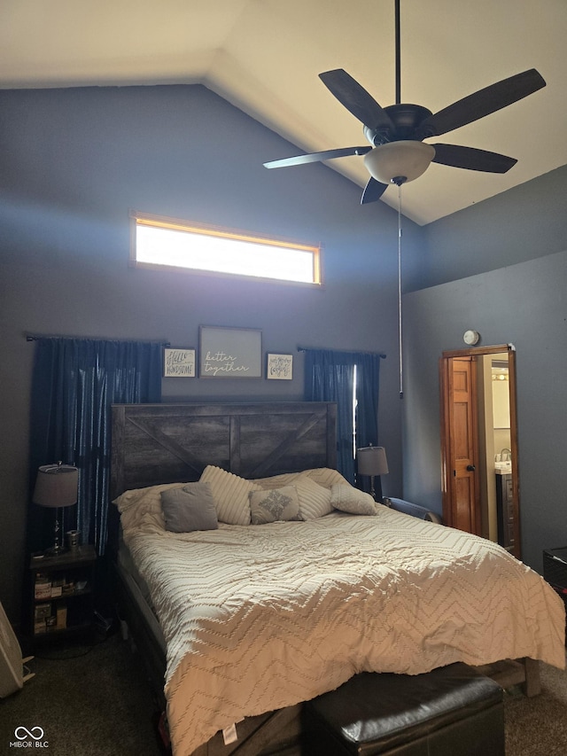 carpeted bedroom featuring ceiling fan, multiple windows, and vaulted ceiling