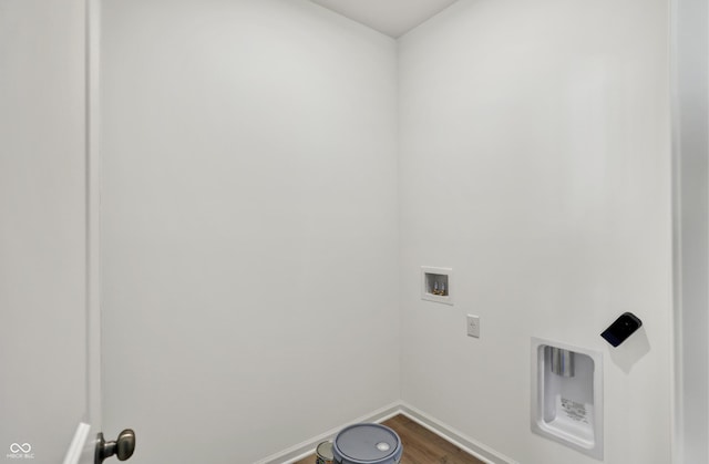 19714 Highclere Ln, Sheridan, IN 46069 - washroom featuring laundry area, hookup for a washing machine, baseboards, and dark wood-style flooring