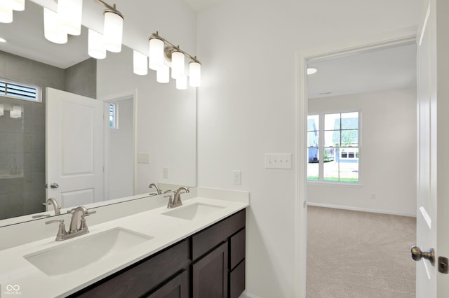 19714 Highclere Ln, Sheridan, IN 46069 - bathroom featuring double vanity, a sink, and baseboards