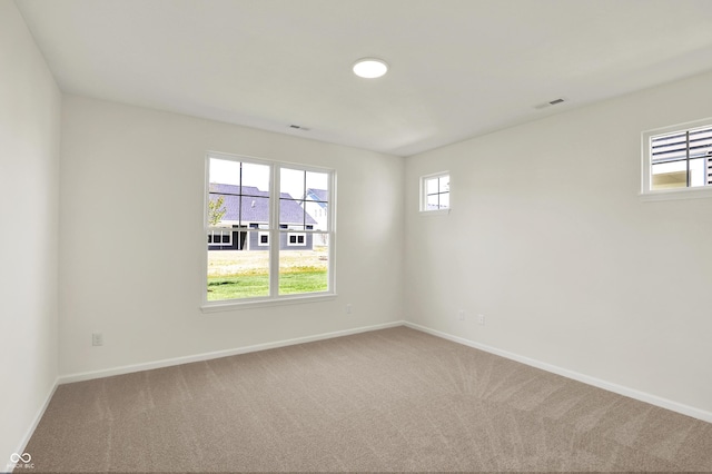 19714 Highclere Ln, Sheridan, IN 46069 - empty room featuring baseboards, carpet, and visible vents