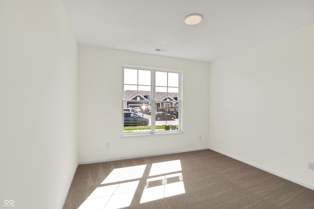 19714 Highclere Ln, Sheridan, IN 46069 - empty room with baseboards, carpet, and visible vents