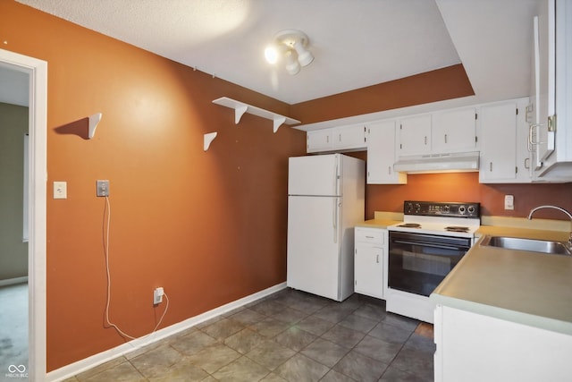 kitchen featuring under cabinet range hood, white appliances, a sink, white cabinets, and light countertops