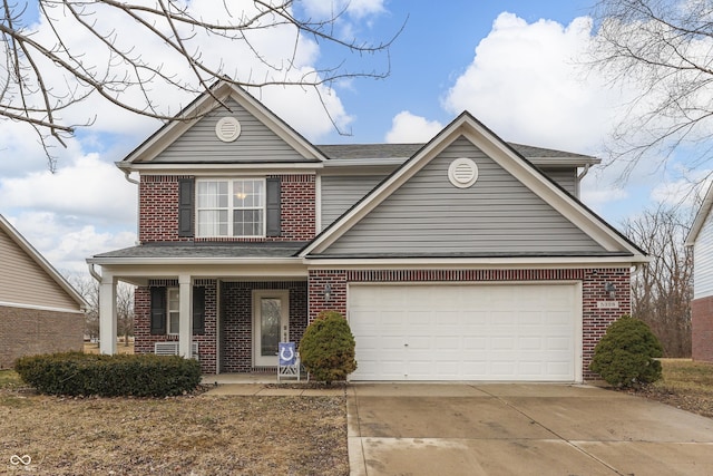 traditional home featuring a garage, driveway, brick siding, and a porch