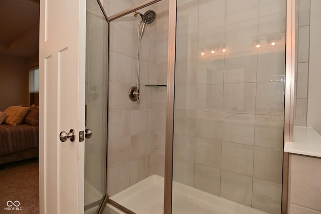 ensuite bathroom featuring a tile shower and ensuite bath