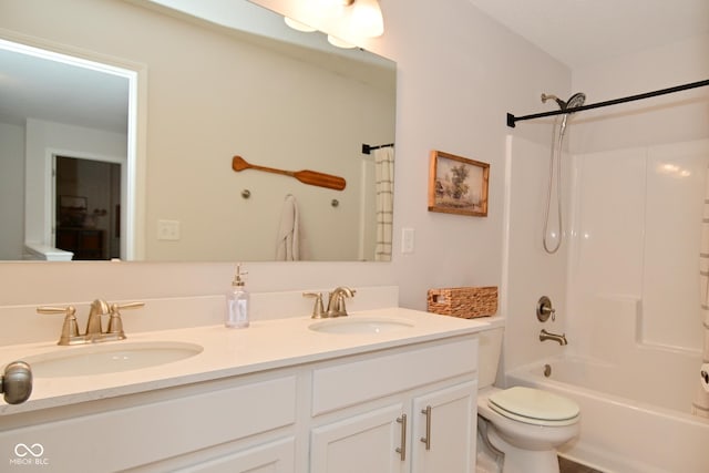 full bath with shower / tub combo with curtain, a sink, toilet, and double vanity