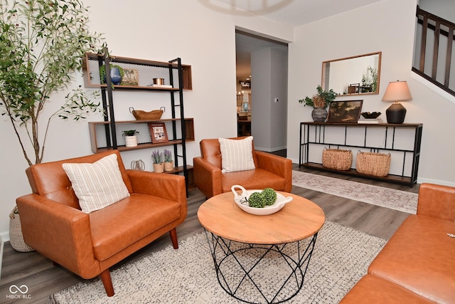 sitting room featuring wood finished floors